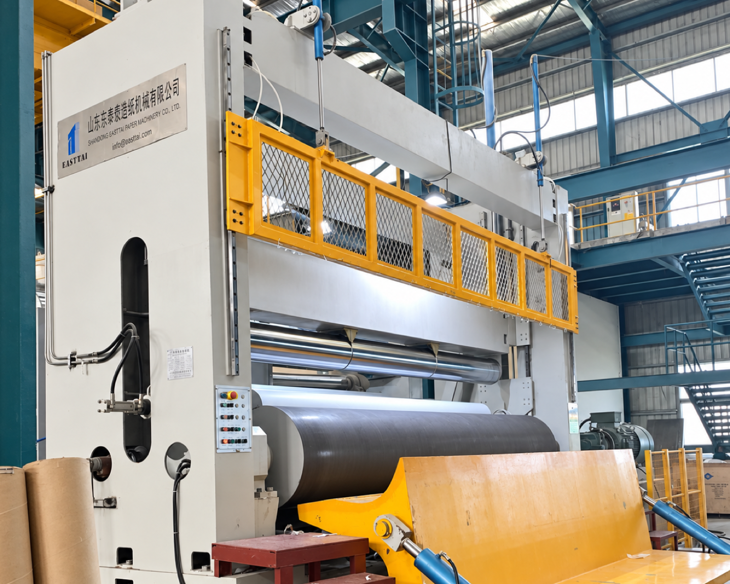 Bottom feeding rewinder
